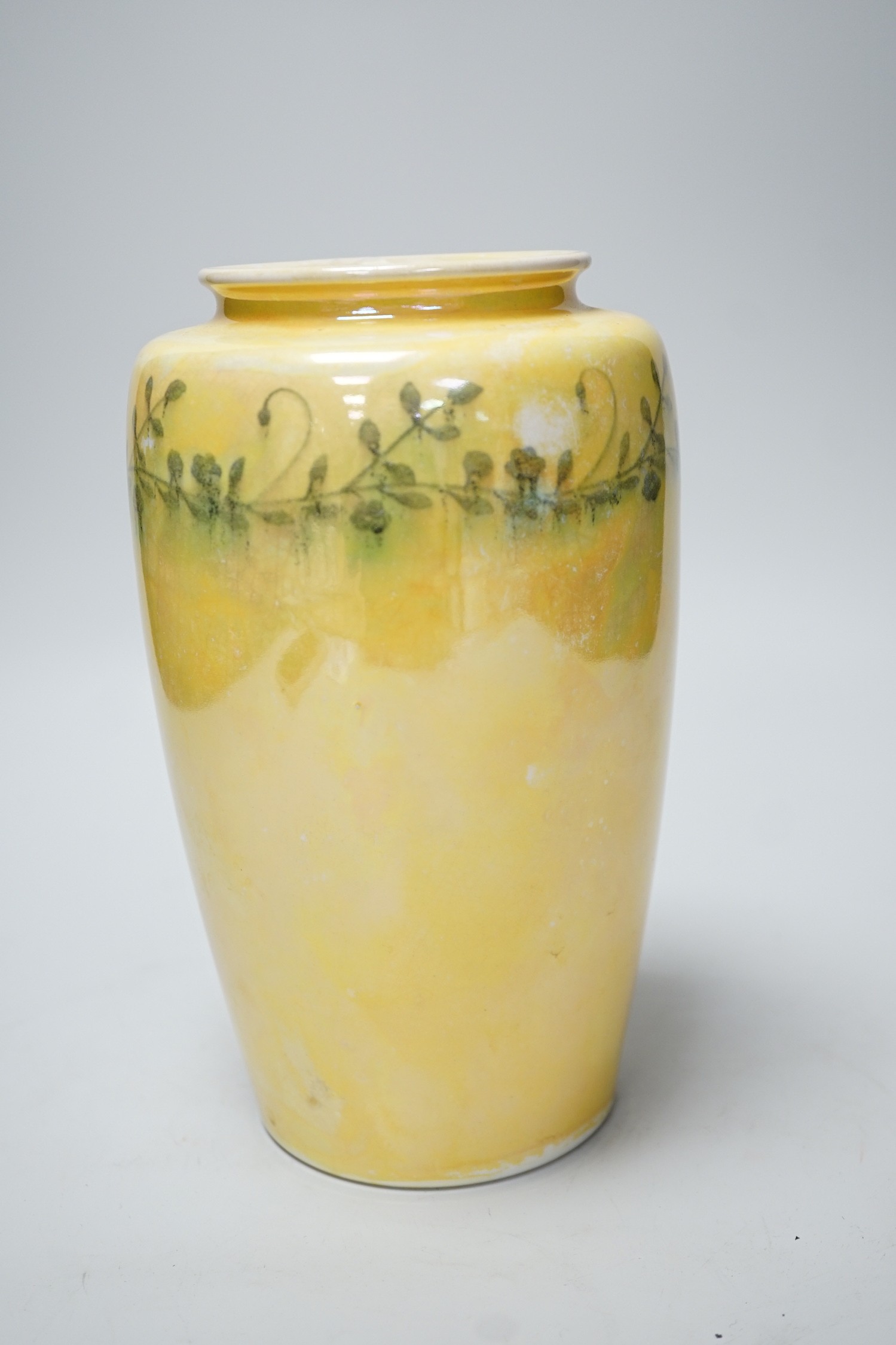 A Ruskin yellow waterglazed vase stamped and printed mark to base 1915, 21cm tall